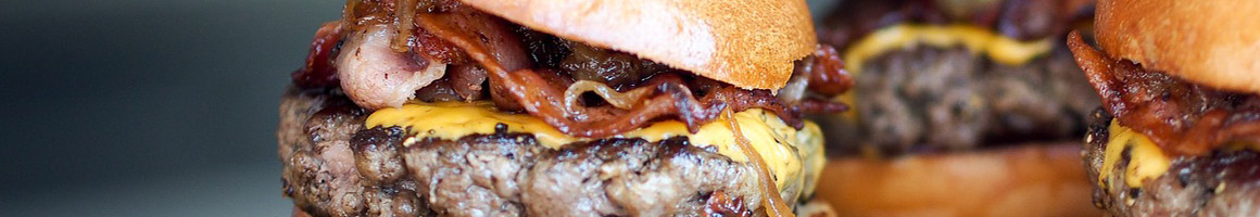 Eating American (Traditional) Burger Fast Food at Swensons Drive-In restaurant in Akron, OH.